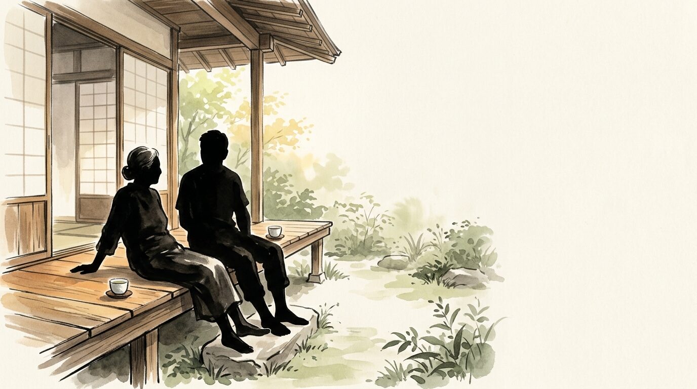 親子が縁側か食卓で並んで、何でもない時間を過ごす後ろ姿。会話するでもなく、ただ同じ景色を見ている穏やかさ。「今を共に過ごす」実践を象徴。あたたかい自然光。